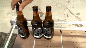 700NW Pressure Sensitive Labeler applies three labels