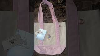 New Daisy Duck Tote Bag 💜🤍💛🎀🦆 She's too cute!! #disney #disneyshopping #disneygirl