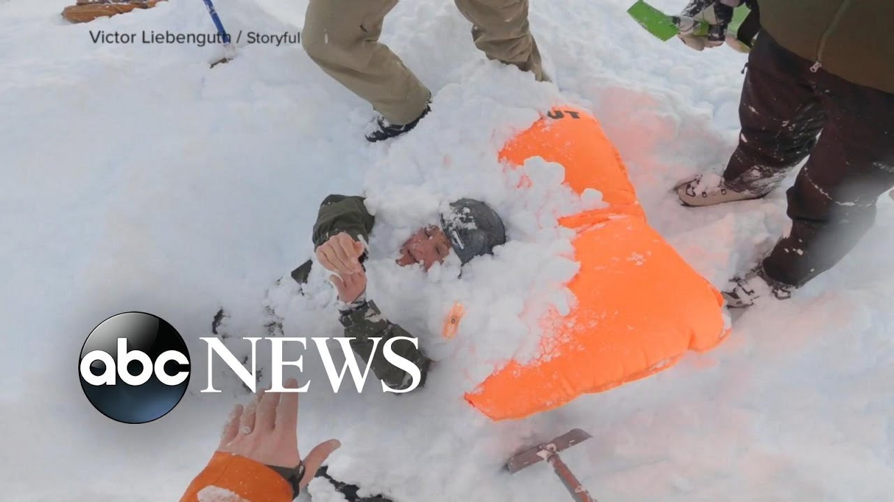 Video shows a skier trapped in the French Alps and rescued by fellow skier
