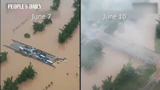 The trunk road, Jiaxiu Bridge in S China's Guangxi had been flooded and submerged