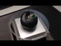 Anello in platino con diamanti e smeraldo