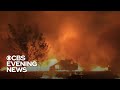 Families flee to safety as Western wildfires continue