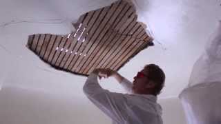 Interior plaster repairs on a ceiling