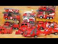 Let's line up some bright red fire trucks and test them out! A collection of miniature fire trucks.