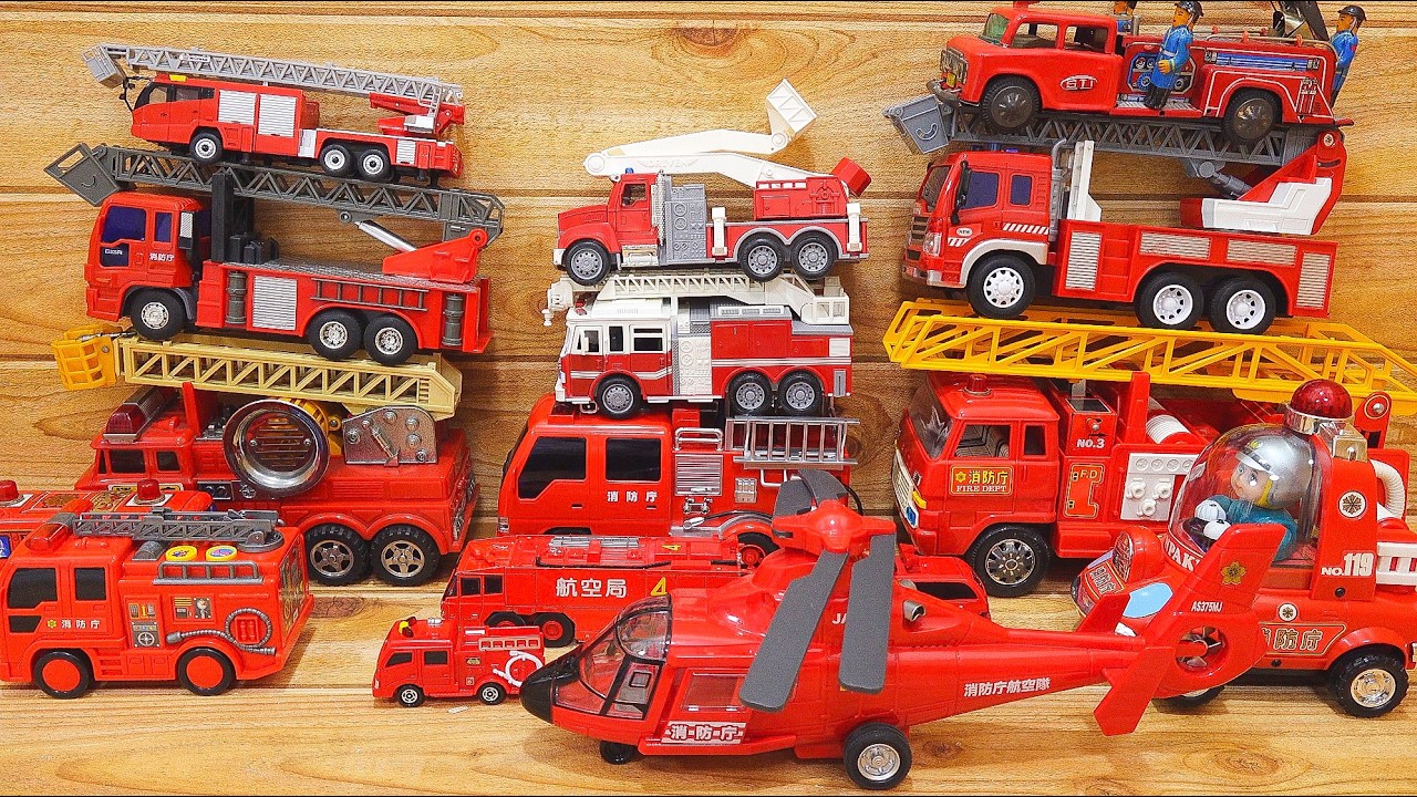 Let's line up some bright red fire trucks and test them out! A collection of miniature fire trucks.