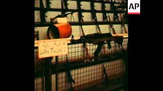 SYND 10 12 74 DISPLAY OF CAPTURED TERRORISTS WEAPONS IN SANTIAGO