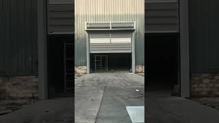 Is stainless steel or aluminum frame better for high speed doors in humid or corrosive environments?