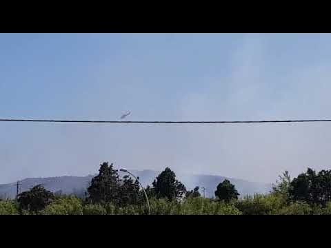Tortolì, incendio nella zona di Rio Foddeddu: un elicottero impegnato nello spegimento