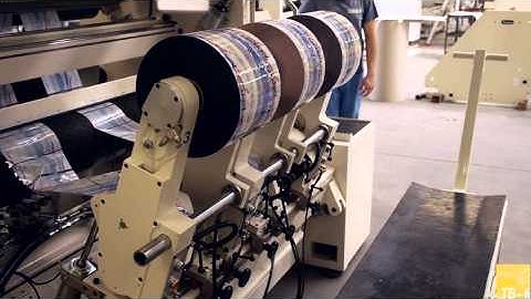 TB6 M CENTRE SURFACE WITH INDIVIDUAL REWIND STATIONS SLITTER REWINDER