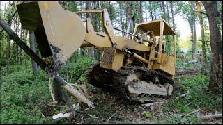 Knocking down trees with a Track loader