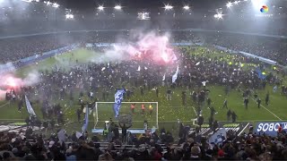 Celebrity Malmo fans storm pitch and mob players with flares and fireworks after winning league. Wealth