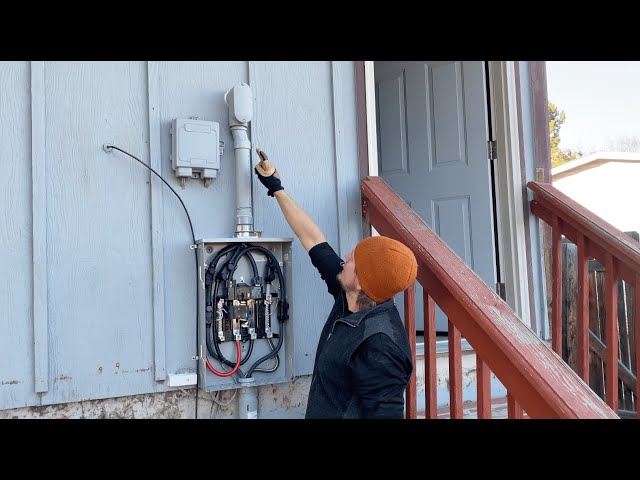 Setting up a Panel on the Outside of a Home 