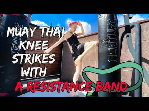 Muay Thai knee strikes with resistance band 🔥
