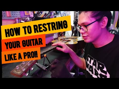 How to Re-string  your Guitar like a PRO!