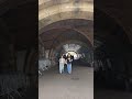 walking through a Prospect Park tunnel