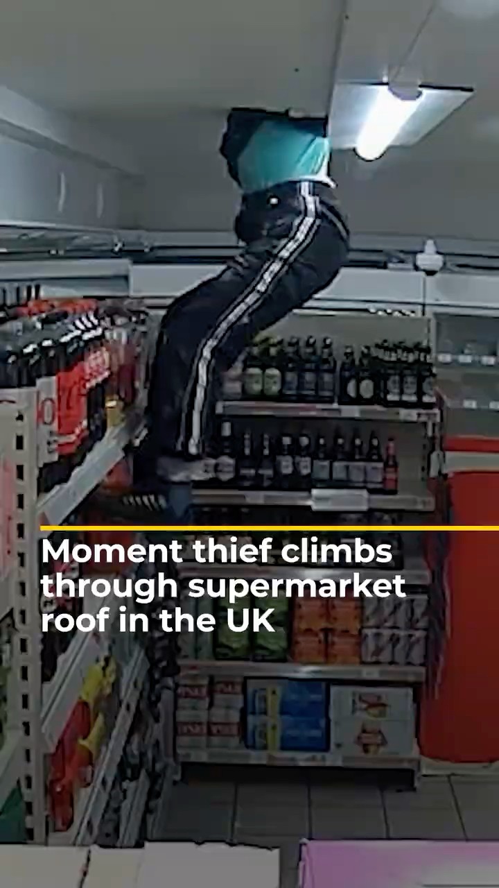 Thief in UK caught on camera climbing through supermarket roof | AJ#shorts
