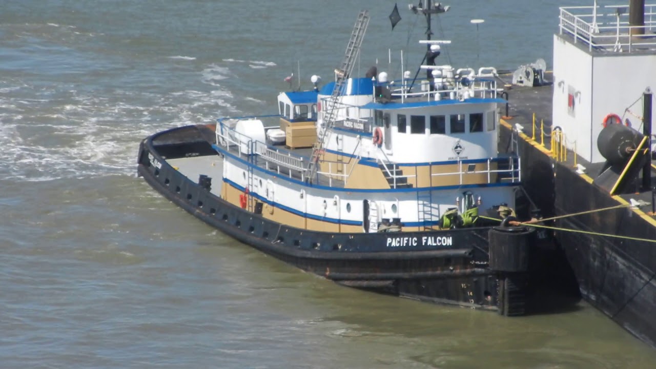 65 Roses getting help from two tugs - YouTube