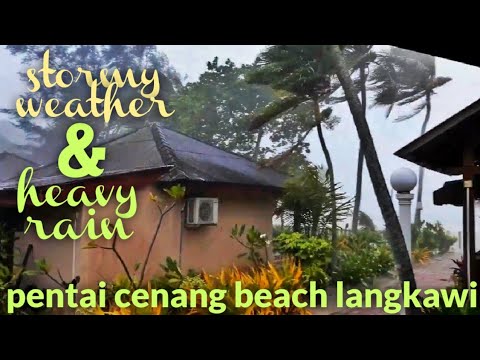 pentai cenang beach Langkawi Malaysia stormy weather heavy rain...