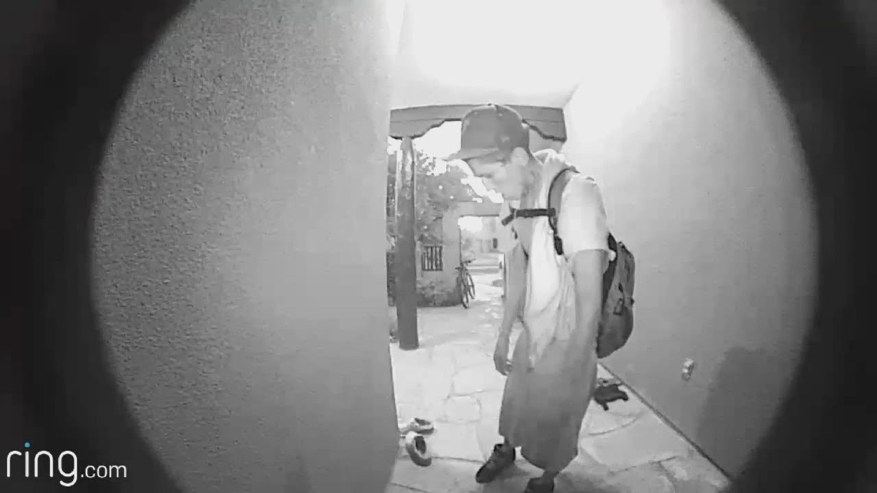 Thief caught on surveillance stealing shoes from man's home - YouTube