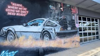 1980’s movie murals, beefy king, and planet hollywood