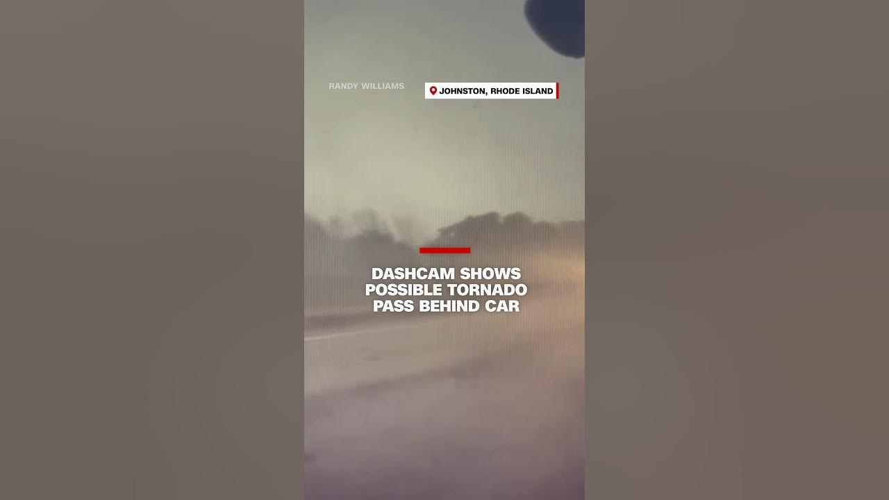 Dashcam shows possible tornado pass behind car