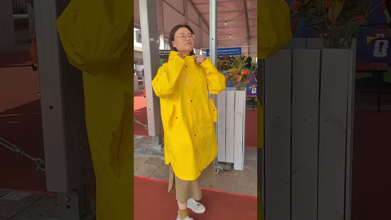 Korean fashion long yellow fully waterproof raincoat jacket, against heavy rain, hood with brim