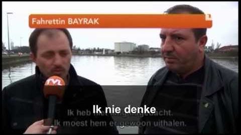 Redders redden man uit kanaal Genk