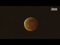 Lunar eclipse and super blood moon time lapse over Seattle