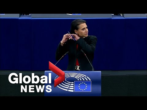 "women, life, freedom": eu lawmaker cuts hair at podium during debate on iran protests