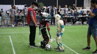 RoboCup 2022 Humanoid AdultSize Round Robin: NimbRo vs. HERoEHS