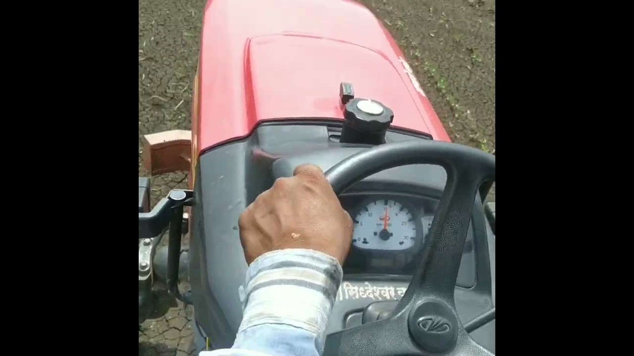 Mahindra Jivo 245 di 4wd Tractor Spraying Soyabean Crop/