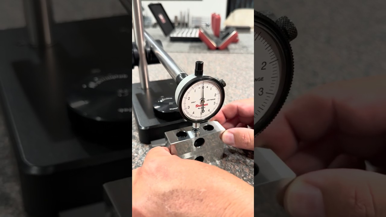 Inspecting Starrett No.706 setup blocks on the granite surface plate. 