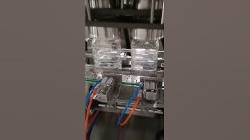 Automatic two head jar film sealing closing machine