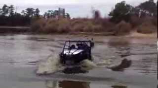 Ryans custom built Kawasaki TERYX in the mud and water off roading