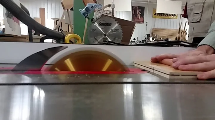 Slow motion demonstration of the SawStop on a hot dog at CUWoodshop