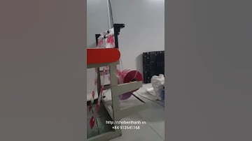 Máy cắt miệng dán đáy bọc bịch thanh long.