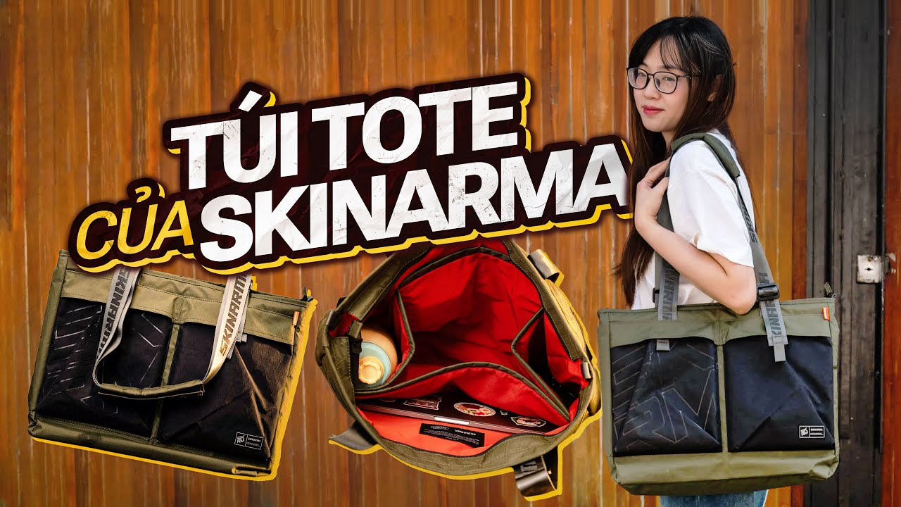 Trên tay túi tote của Skinarma: được thiết kế hợp lí, có chia ngăn sẵn, đựng được nhiều đồ