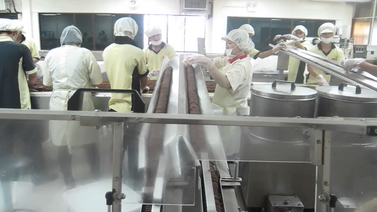 2 color 2 lane sandwiching machine max speed 620pcs per min  -APEX MACHINERY