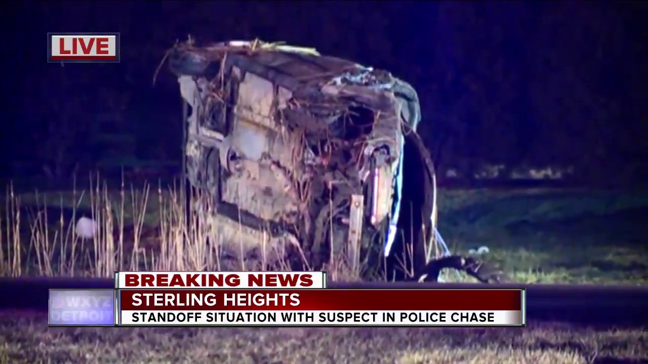 Standoff situation with suspect in police chase - YouTube