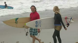 Sunday's Strong Winds Brought Surfers Out To The Beach