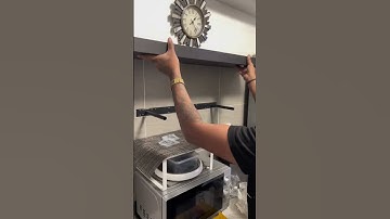 Installation of IKEA floating shelves in the kitchen .