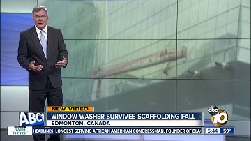 Window washer rescued after scaffolding slams into building