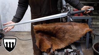 Forging a pattern welded two handed longsword, the complete movie.