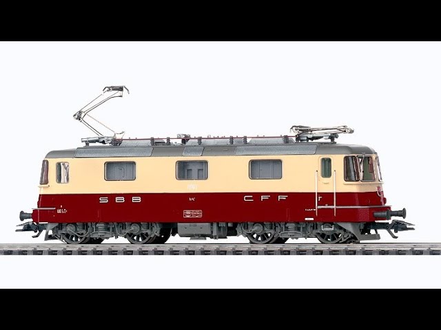 Märklin SBB Re 4/4 II Electric Locomotive pulling Rivarossi 