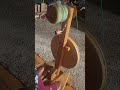 #spinning curly, spring green, #merinoyarn on my #spinningwheel #fiberartist #spinningyarn #dreamy