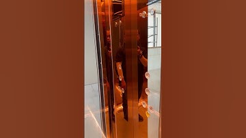 Yzer type of elevator with 2450mm clear height opening. Mirror & titanium finishing.