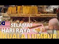 MALAYSIAN STREET FOOD in KUALA LUMPUR: Foreigners Eat LEMANG and RENDANG | HARI RAYA Food