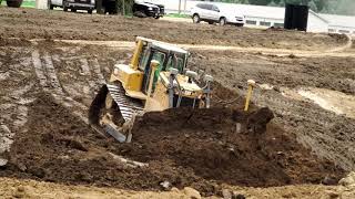 Cat D6T Bulldozer Shaping Retention Pond