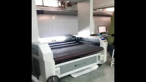 KASU four-head conveyor laser cutting machine and top Canon camera laser cutting digital printed