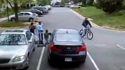 Cary Butler takes "sam" for a bike walk. Walky Dog